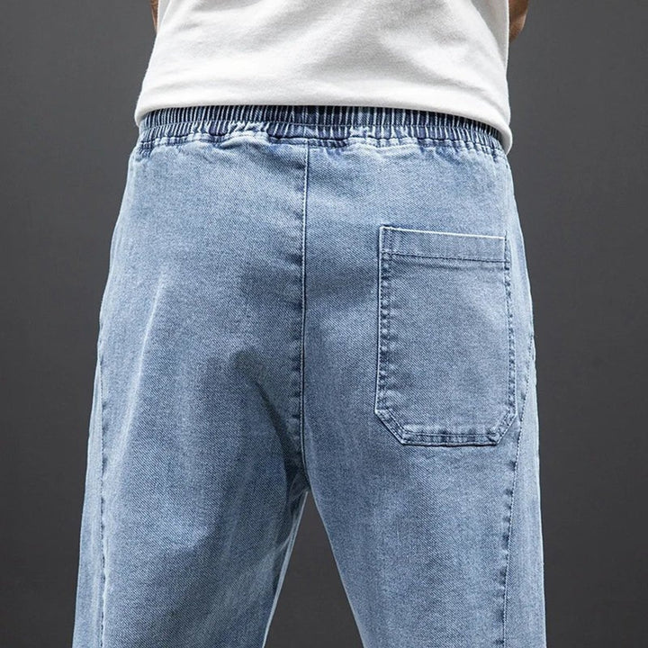 Men's Relaxed-Tapered Stretch Denim Drawstring Jogger Pants